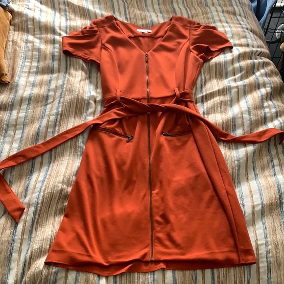 Jessica Simpson Dresses & Skirts - Jessica Simpson dress. Short puff sleeves with zip front and tie.